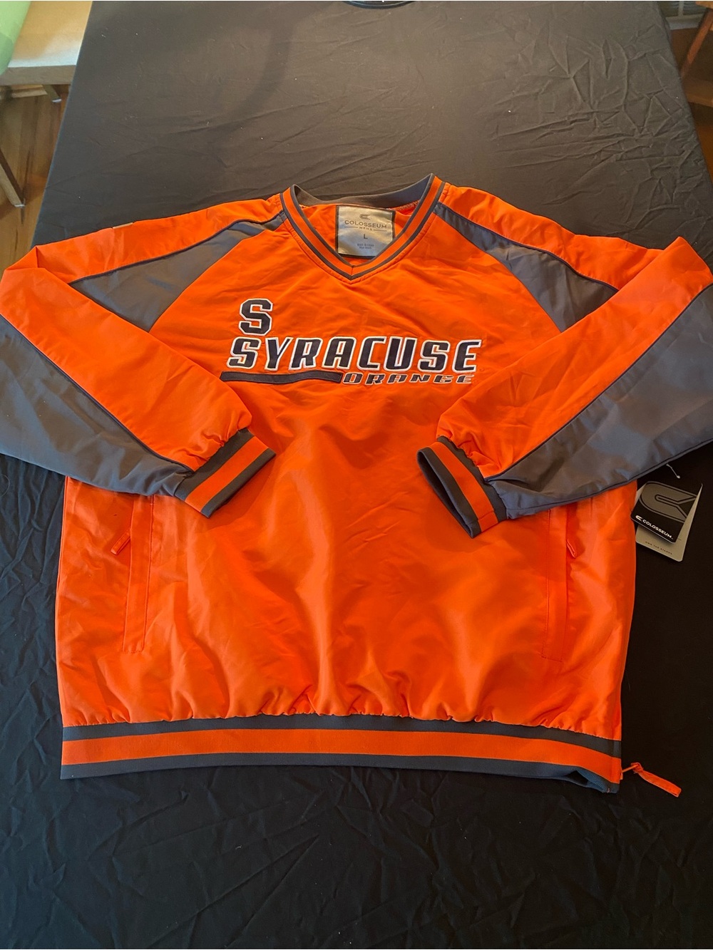 Syracuse Colosseum Orange and Gray Team Jacket Tag Display
